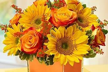 Alegre composición Flores Naranjas y Amarillas